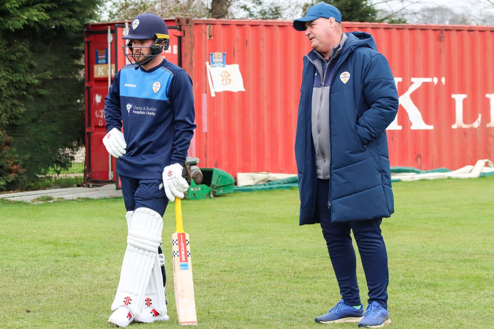 Mickey Arthur and Caleb Jewell in the nets